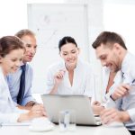 friendly business team having meeting in office